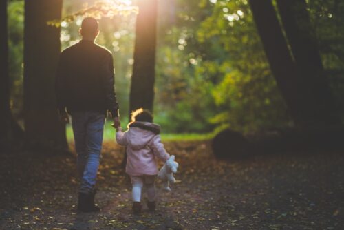 father walking child