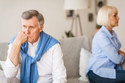 older couple facing different directions