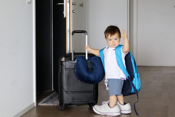 baby with suitcase